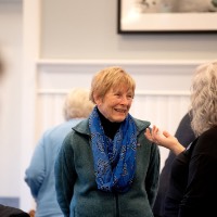 Sue Neat smiling as she talks to Susan Proctor